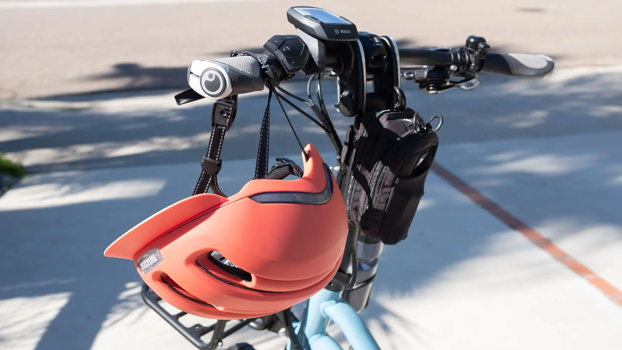 Bicycle helmet hangs from the handlebars of an e-bike in Encinitas, California