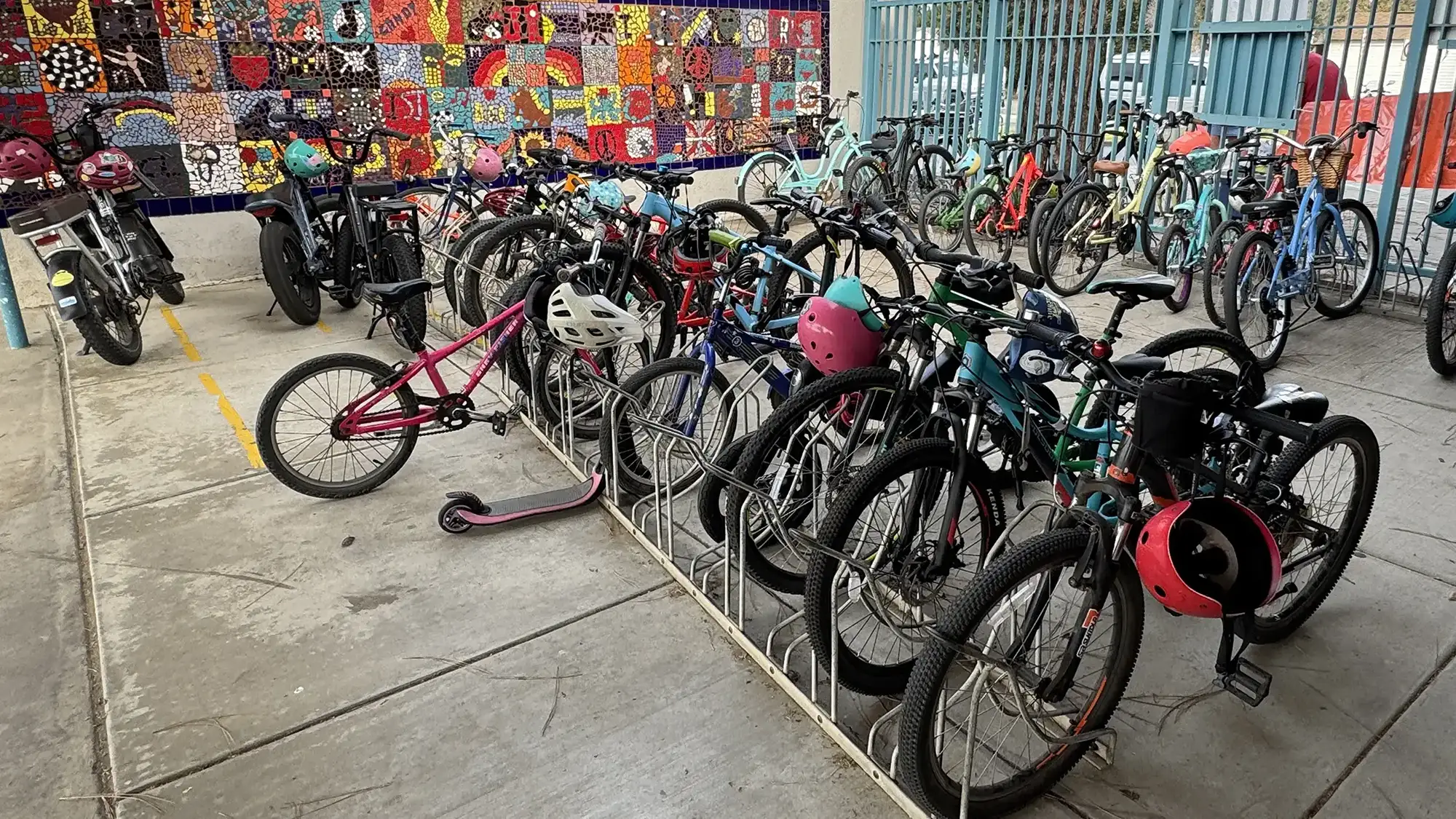 A bike corral full kid's bikes at an elementary school.