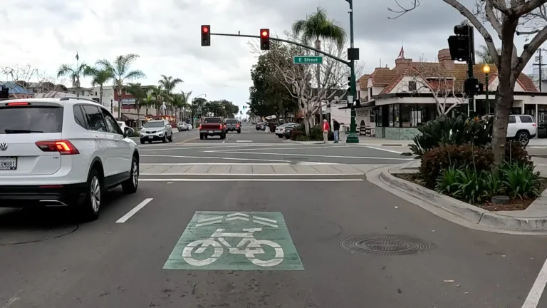 Highway 101 in downtown Encinitas, California is marked as a Class III Bike Route with a sharrow