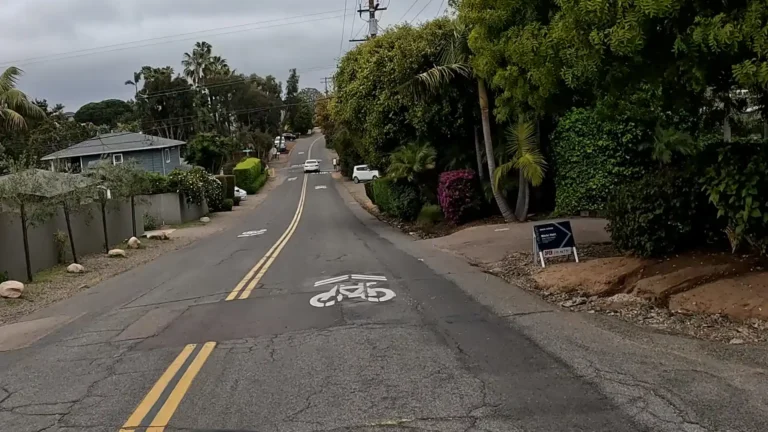 Cyclist's POV riding a Class III Bike Route with sharrows. Requeza St. in Encinitas, California
