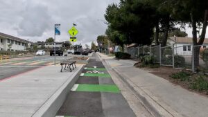 Cyclist POV of the eastbound separated bikeway on Santa Fe Dr near San Dieguito Academy in Encinitas, California