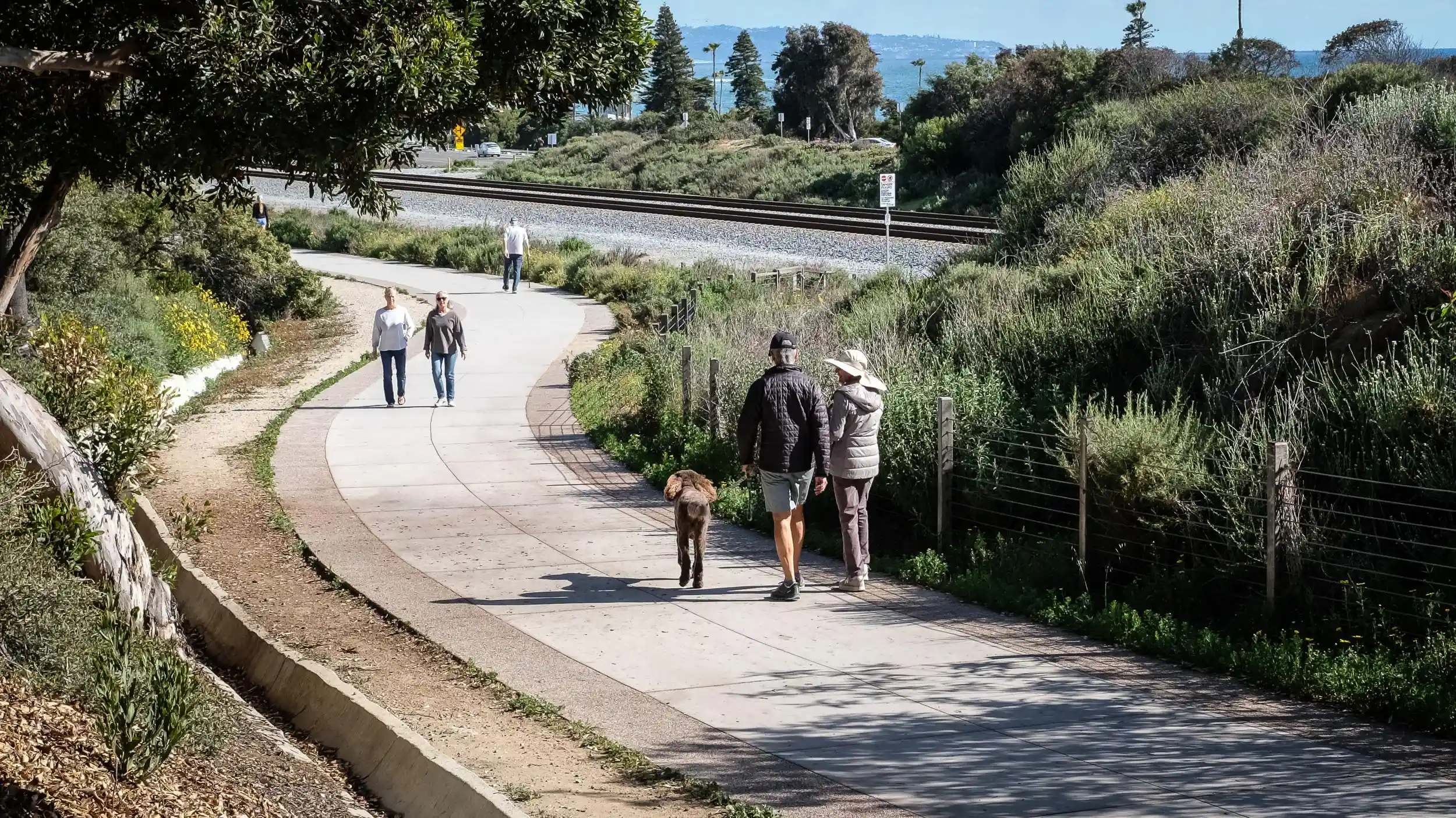 Seniors walking on the Coastal Rail Trail in Encinitas, California
